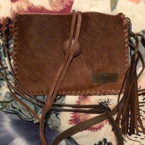 Never used cowhide purse